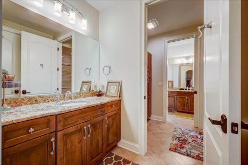 Edington bathroom with wood vanity