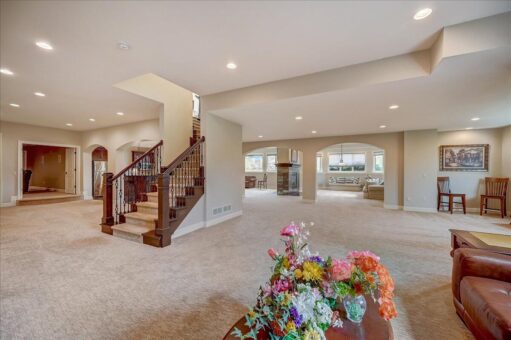Edington lower level with staircase and sitting area