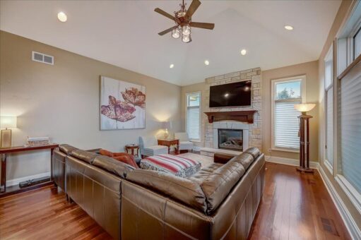 Edington hearth room with sectional and fireplace