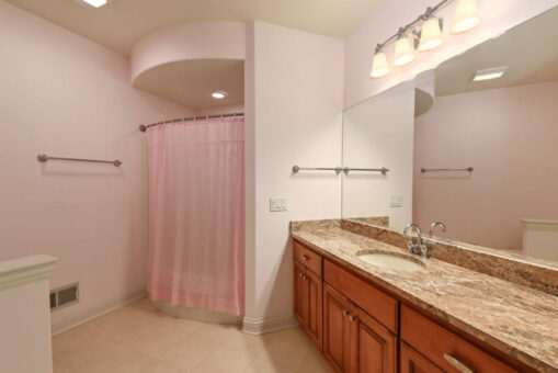 Benington bathroom with cherry vanity