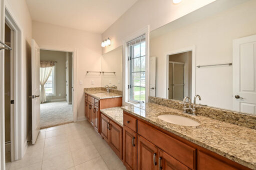 Benington bathroom with cherry double vanity