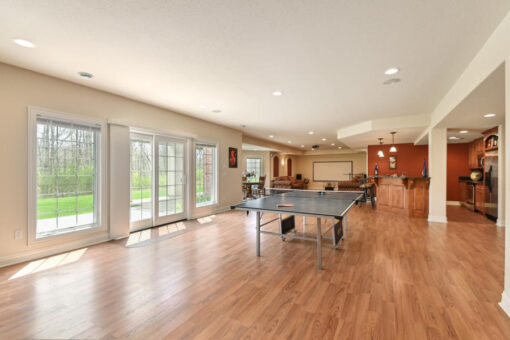 Benington lower-level game room with walk-out doors