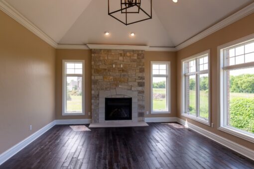 Stone Creek hearth room with stone fireplace