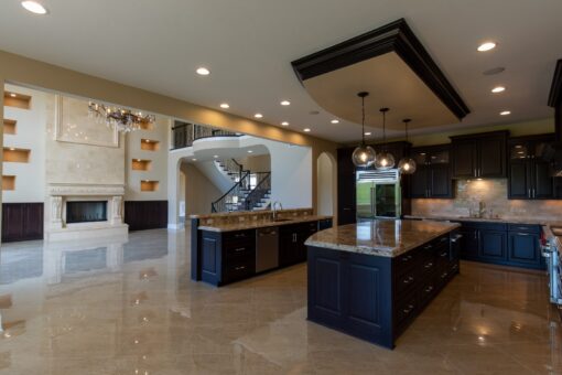 Stone Creek kitchen with ceiling detail and islands