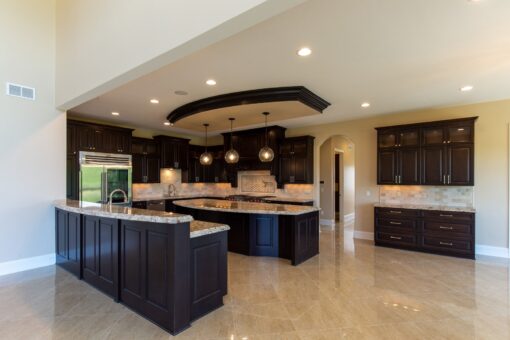 Stone Creek kitchen with two dark islands