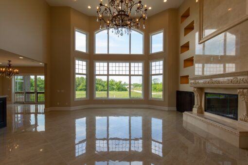 Stone Creek two-story great room with window wall