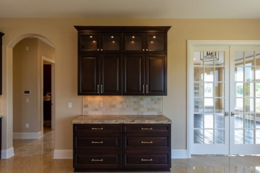 Stone Creek kitchen hutch with dark cabinetry