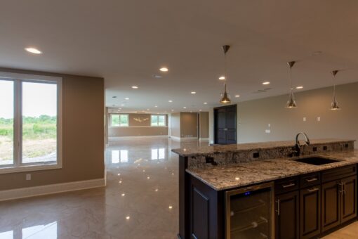 Stone Creek lower-level bar with granite counter