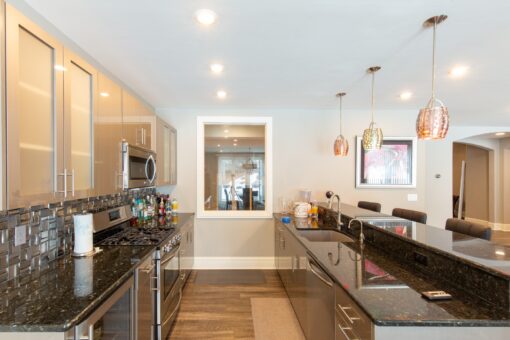 Summerhill lower-level kitchen with stainless counters