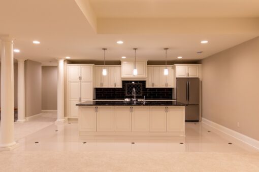 Vizzini lower-level kitchen with white island