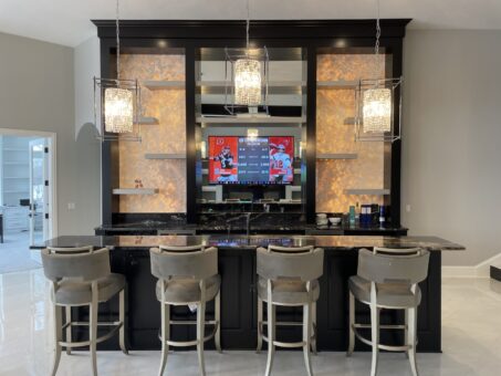 Shire lower-level bar with backlit stone panels