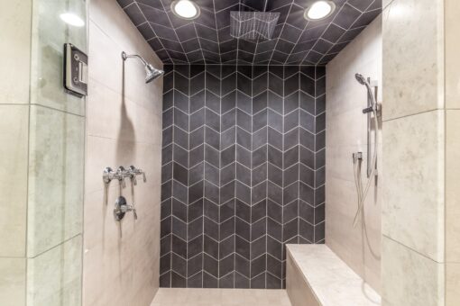 Davidson walk-in shower with black chevron tile
