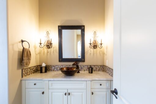 Summerhill bathroom with white vanity and sconces
