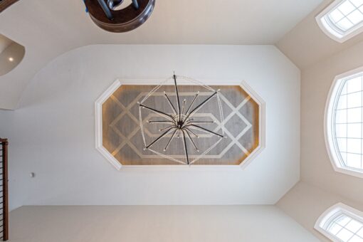 Birchwood ceiling with layered trim detail