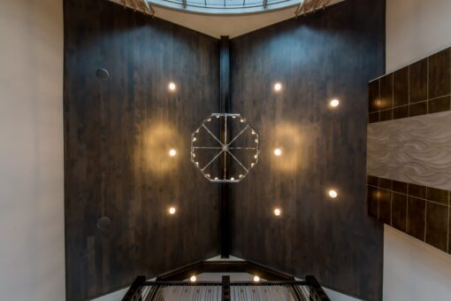 Compton vaulted wood ceiling with chandelier