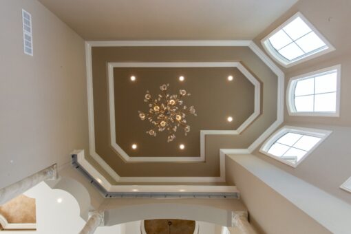 Shire layered tray ceiling with chandelier