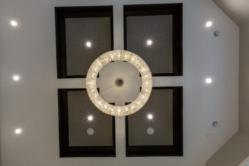 Shire coffered ceiling with round crystal chandelier