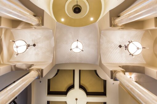 Kingfogl custom home columned gallery ceiling with domes and pendant lights