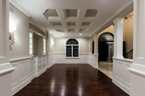 Kingfogl custom home dining room with coffered ceiling, wainscoting and columns
