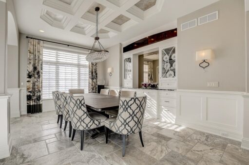 Kingfogl custom home dining room with coffered ceiling and built-in buffet