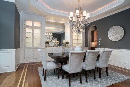 Brookridge dining room with chandelier and coffered ceiling