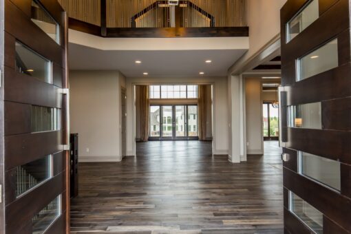 Compton foyer with balcony and window wall