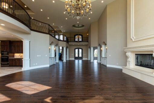 Grand Haven two-story foyer with chandelier and balcony