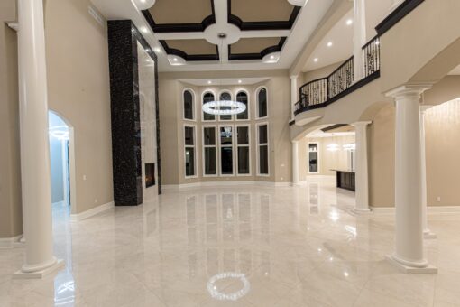 Saddlebrook foyer with coffered ceiling and window wall