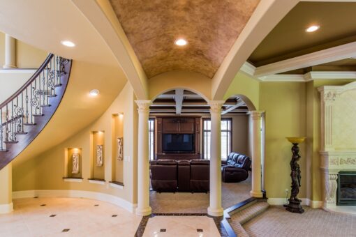 Brandywine foyer with columns and arched niches