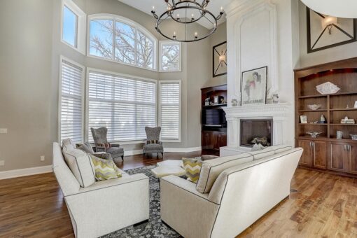 Wildwood two-story great room with fireplace and window wall