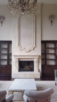 Presidio great room fireplace with carved overmantel