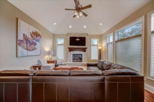 Edington hearth room with fireplace and windows