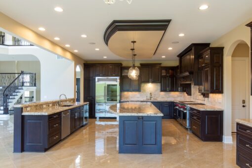 Stone Creek kitchen with two islands and granite counters
