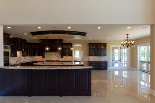 Stone Creek kitchen with two islands and dark cabinetry