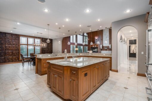 Brookridge kitchen with two islands and wood cabinetry
