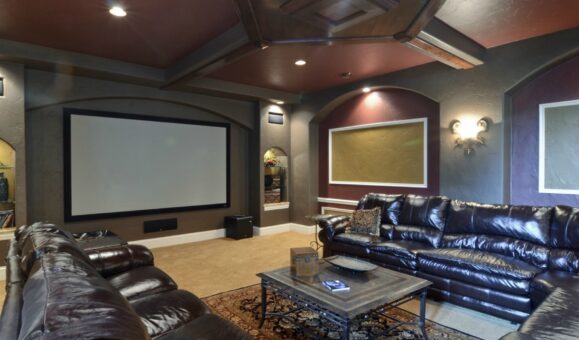 Buckingham lower-level home theater with leather seating