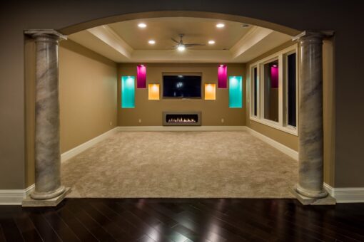 Presidio lower-level family room with colored accent lighting
