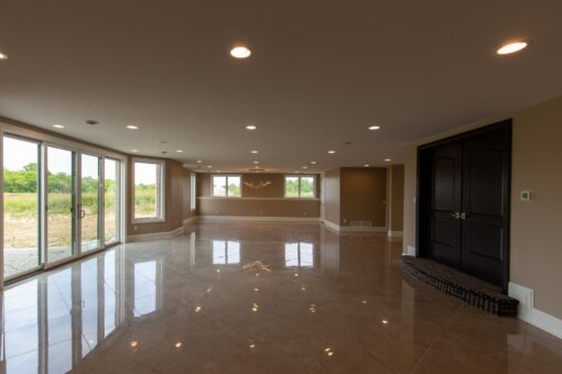 Stone Creek lower-level open space with marble floors