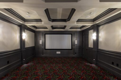 Rivendell lower-level home theater with coffered ceiling