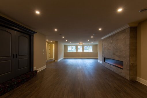 Rivendell lower-level family room with walk-out windows