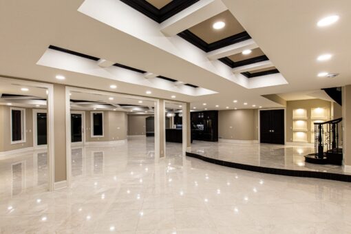 Saddlebrook lower level with coffered ceiling and lit niches