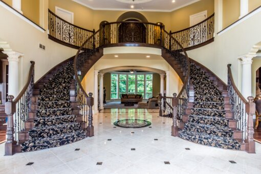 Brandywine foyer with double curved staircase