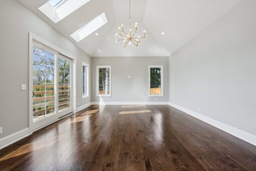Rangeline hearth room with skylights and chandelier