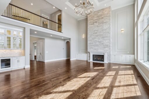 Rangeline great room with balcony and fireplace