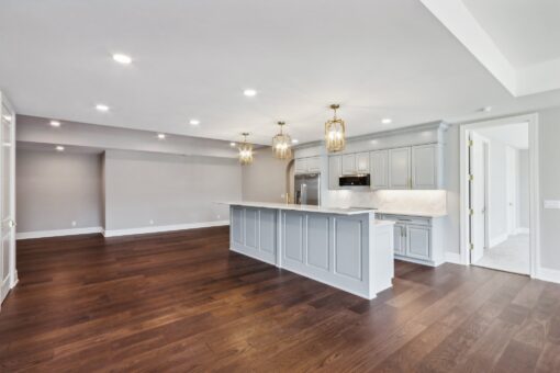Rangeline lower-level kitchen with gray island