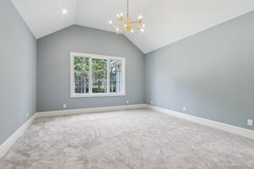 Rangeline bedroom with vaulted ceiling