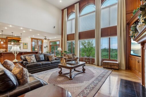 Danbury two-story great room with window wall
