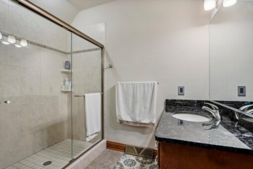Danbury glass shower and granite vanity