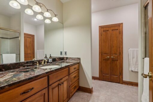 Danbury bathroom with wood vanity and double sinks