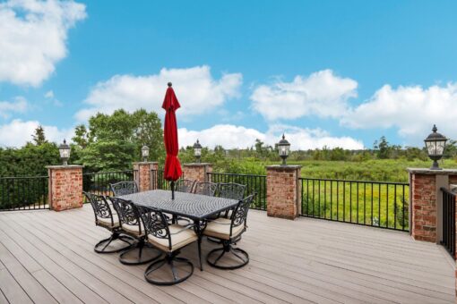 Danbury deck with outdoor dining and lawn view